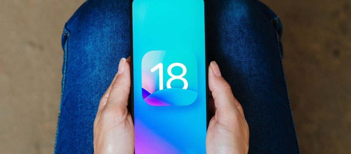 iOS 18 logo on iPhone in person