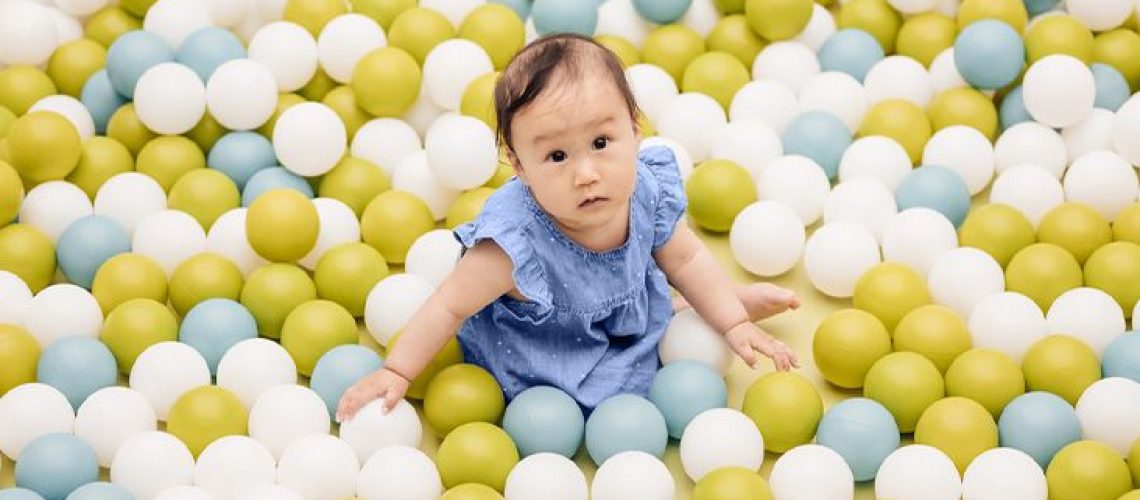 Infant in a ball pit