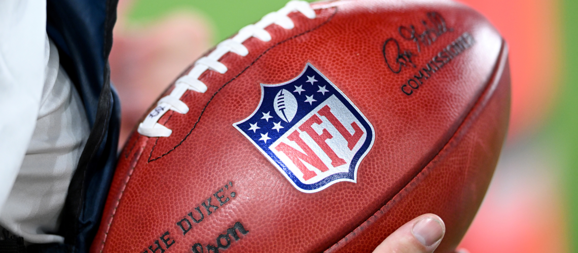 A view of the NFL Logo on a football in the game between the Baltimore Ravens and the Indianapolis Colts during the NFL Preseason 2025 game at M&amp;T Bank Stadium on August 07, 2025 in Baltimore, Maryland.