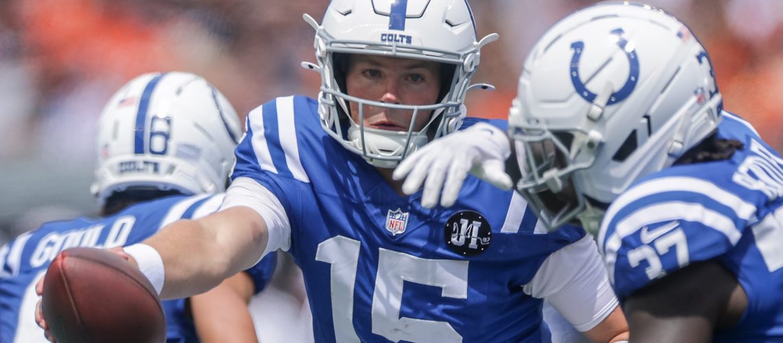 CINCINNATI, OHIO - AUGUST 23: Riley Leonard #15 of the Indianapolis Colts hands off to Ulysses Bentley IV #37 of the Indianapolis Colts during the NFL Preseason 2025 game between Indianapolis Colts and Cincinnati Bengals at Paycor Stadium on August 23, 2025 in Cincinnati, Ohio. (Photo by Michael Hickey/Getty Images)