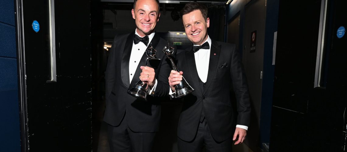 Ant McPartlin and Declan Donnelly pose with the Bruce Forsyth and TV Presenter backstage during the NTAs 2024 at The O2 Arena on September 11, 2024 in London, England.