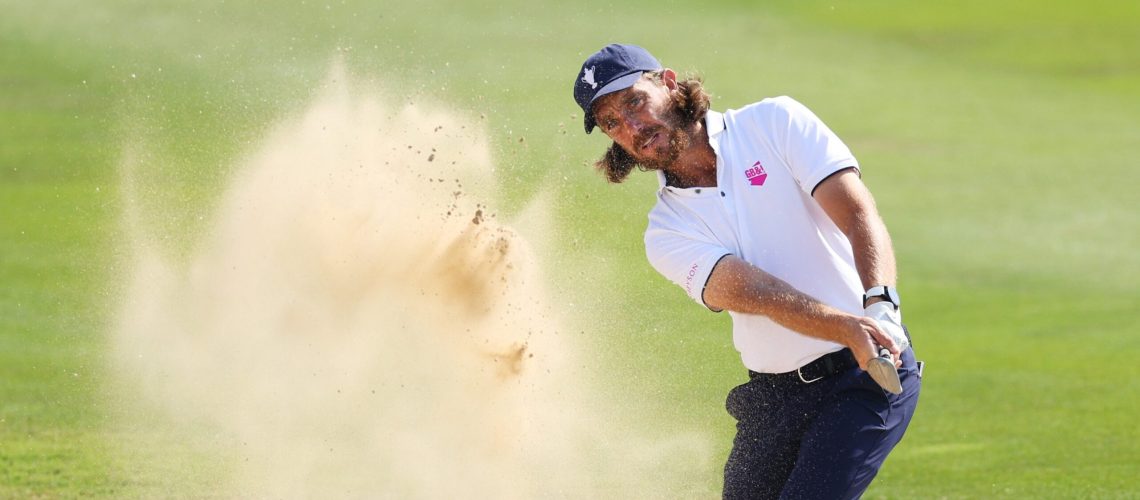 Tommy Fleetwood of Team Great Britain &amp; Ireland plays a bunker shot on the eighth hole during a practice round prior to the Team Cup at Abu Dhabi Golf Resort on January 09, 2025 in Abu Dhabi, United Arab Emirates.