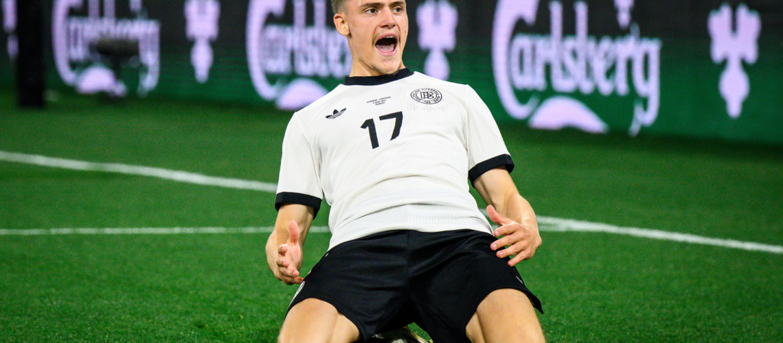 Florian Wirtz of Germany celebrates his team's first goal during the UEFA Nations League 2025 semifinal match between Germany and Portugal at Munich Football Arena on June 04, 2025 in Munich, Germany.