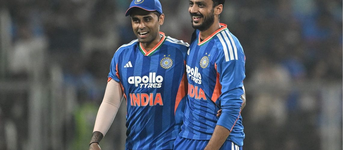 India's Axar Patel (R) celebrates with captain Suryakumar Yadav after taking the wicket of New Zealand's Glenn Phillips during the fifth and final Twenty20 international cricket match between India and New Zealand at the Greenfield International Stadium in Thiruvananthapuram on January 31, 2026. (Photo by R. Satish BABU / AFP via Getty Images) / -- IMAGE RESTRICTED TO EDITORIAL USE - STRICTLY NO COMMERCIAL USE --