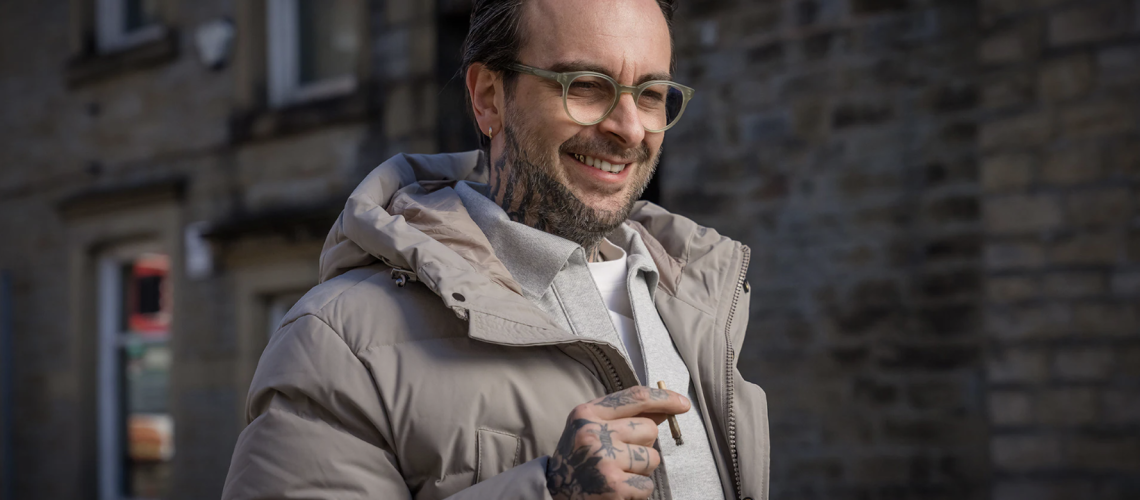 Vinnie O'Neill (Joe Gilgun) smiling in Brassic season 7