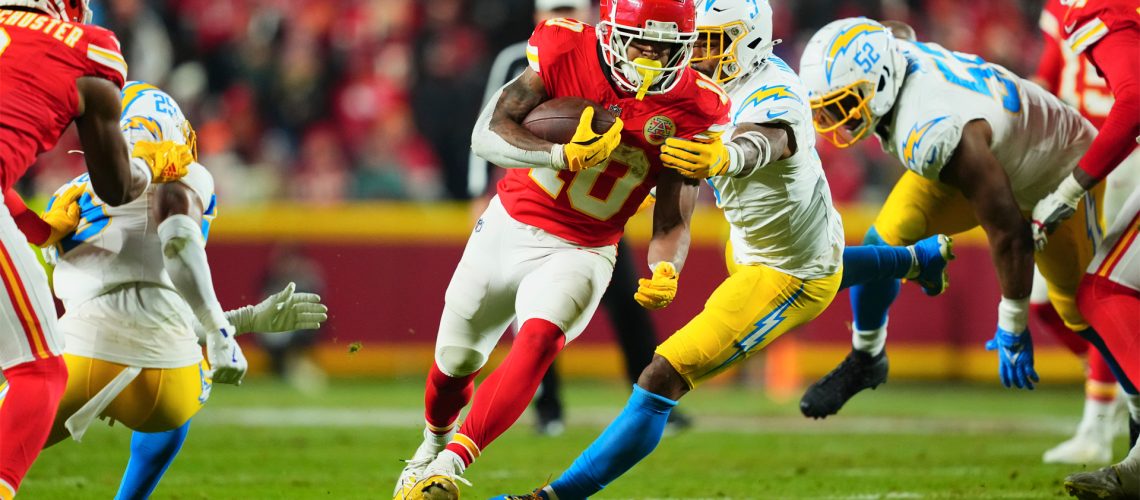 Isiah Pacheco of the Kansas City Chiefs runs with the ball against the Los Angeles Chargers during a December 2024 NFL game