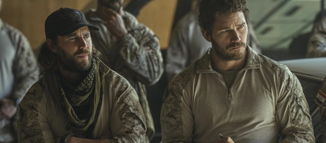 Taylor Kitsch as Ben Edwards and Chris Pratt as James Reece recieving a mission briefing in an episode of The Terminal List: Dark Wolf