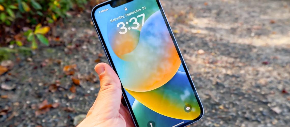 iPhone 14 in hand