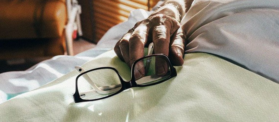 Patient with liver disease lying in hospital bed