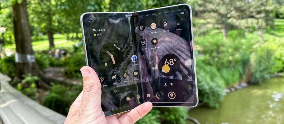 Google Pixel Fold shown in hand