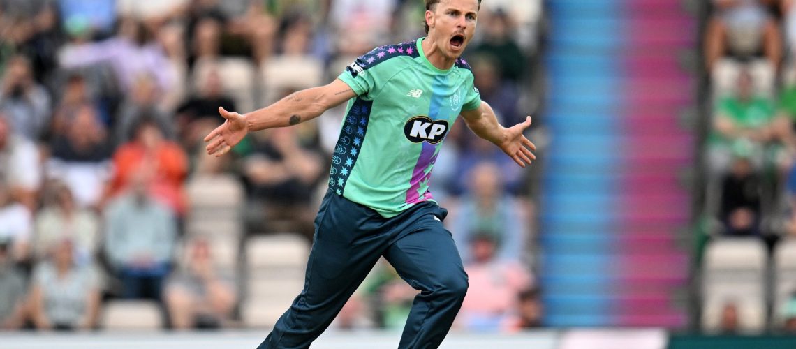 Tom Curran of Oval Invincibles celebrates after taking the wicket of Laurie Evans of Southern Brave during the The Hundred match between Southern Brave Men and Oval Invincibles Men at Utilita Bowl on August 18, 2025 in Southampton, England.