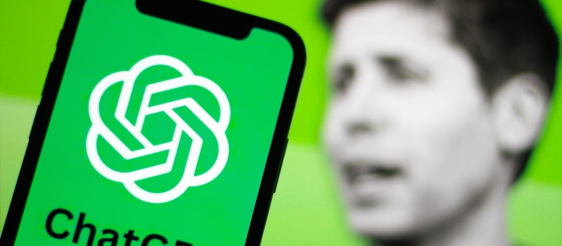 chatgpt logo on phone and blurred image of Sam Altman