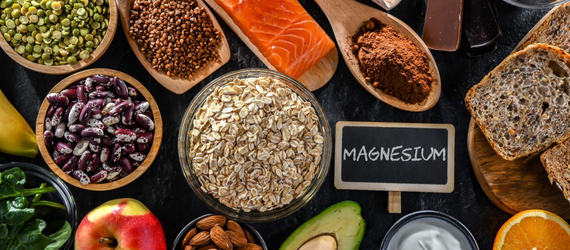 Foods high in magnesium including avocado, salmon and almonds.