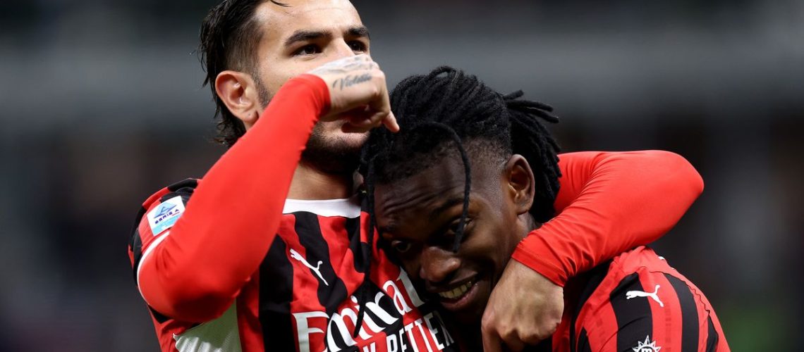 Theo Hernandez of Ac Milan (L) celebrates with his team mate Rafael Leao of Ac Milan (R) ahead of the AC Milan vs Liverpool live stream