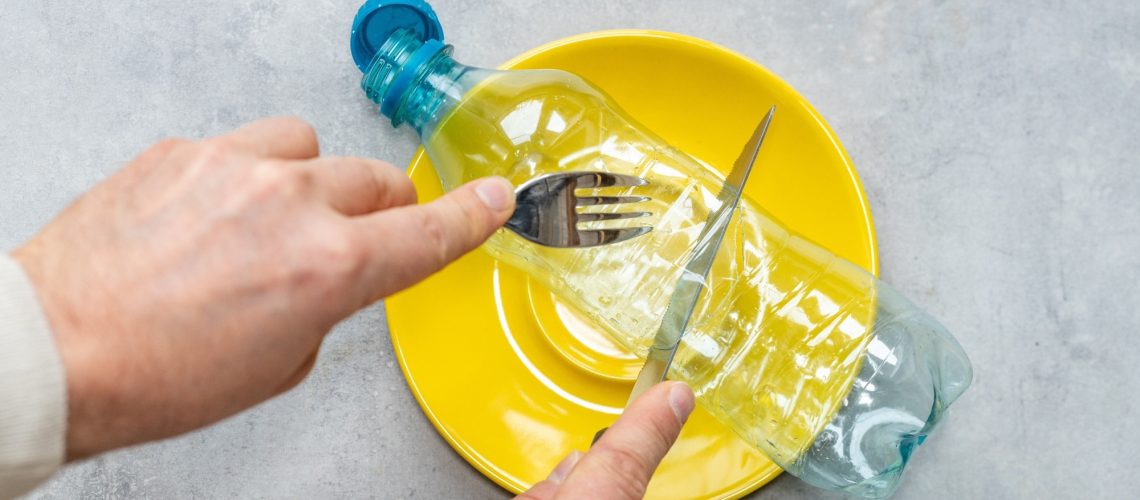 Plastic PET bottle on a plate.