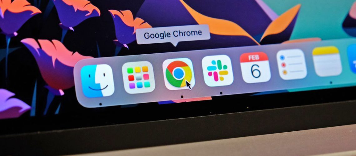 A photo of the Google Chrome app tile appearing in the dock of a MacBook Pro
