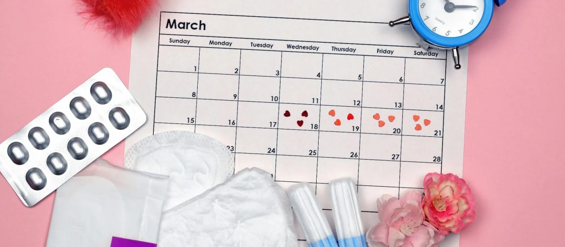 Menstrual pads and tampons by the period of the menstrual cycle on a pink background