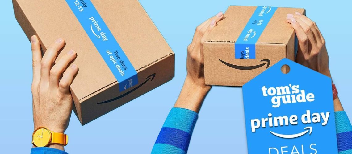 Hands hold Amazon packages bearing Prime Day tape