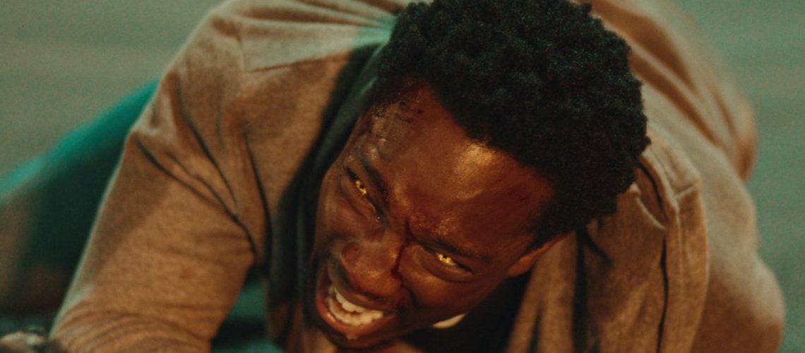Tosin Cole screaming on the floor in Netflix