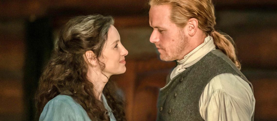 (L to R) Caitríona Balfe as Claire Fraser and Sam Heughan as Jamie Fraser in Outlander season 7