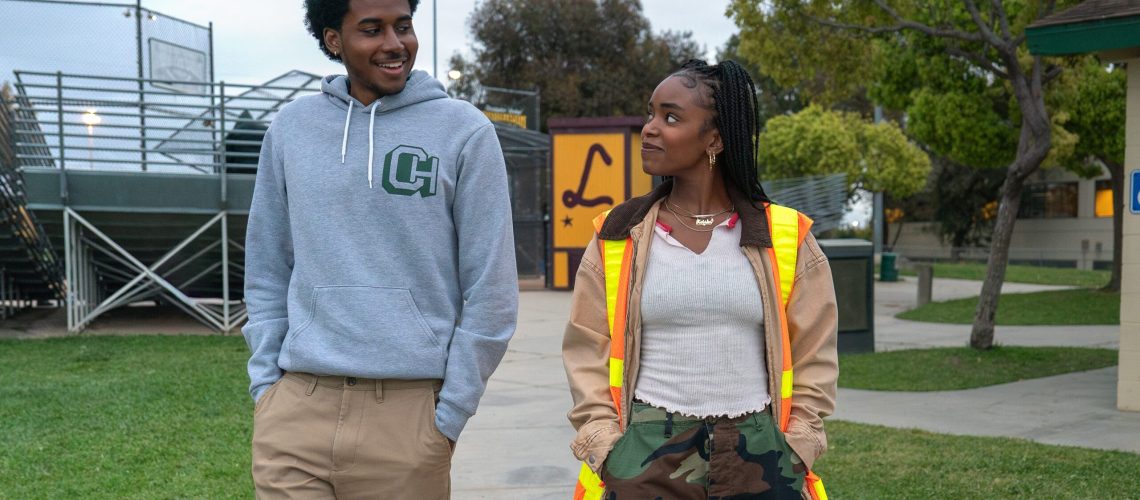 L-R: Justin (Michael Cooper Jr.) and Keisha (Lovie Simone) walking together in a scene from Netflix's "Forever"