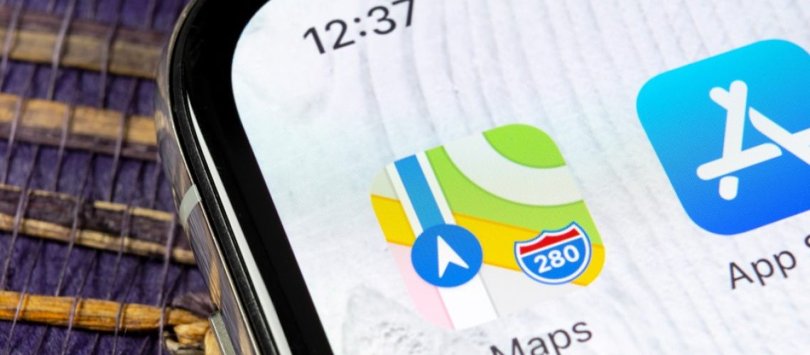 Apple maps logo on iPhone screen