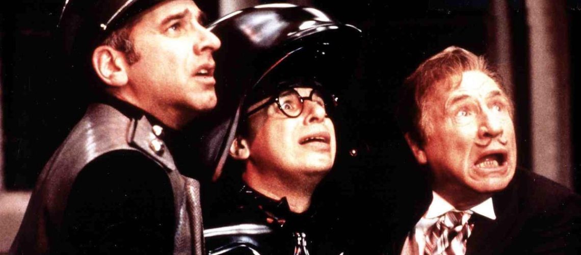 George Wyner (As Colonel Sandurz), Rick Moranis (as Dark Helmet) and Mel Brooks as President Skroob) looking up in fear in Spaceballs