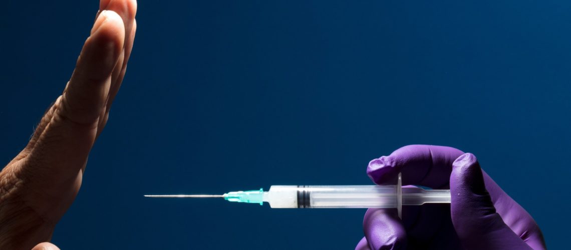 Study: COVID-19 vaccine refusal is driven by deliberate ignorance and cognitive distortions. Image Credit: Nao Novoa / Shutterstock