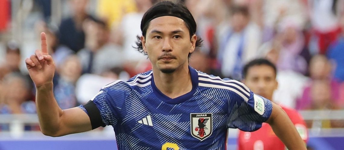Takumi Minamino of Japan celebrates prior to the Iraq vs Japan live stream at the AFC Asian Cup