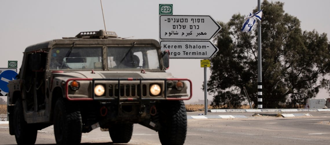 An Israeli army vehicle moves after Hamas fired a mortar attack on May 5, 2024 in Kerem Shalom, Israel. (Amir Levy/Getty Images)