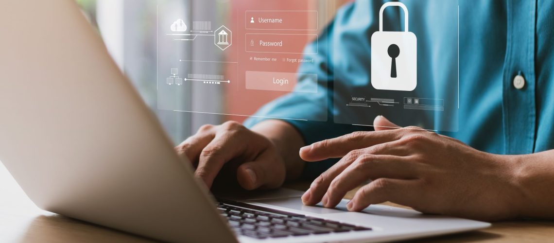 A concept image of a man inputting his login information into a laptop