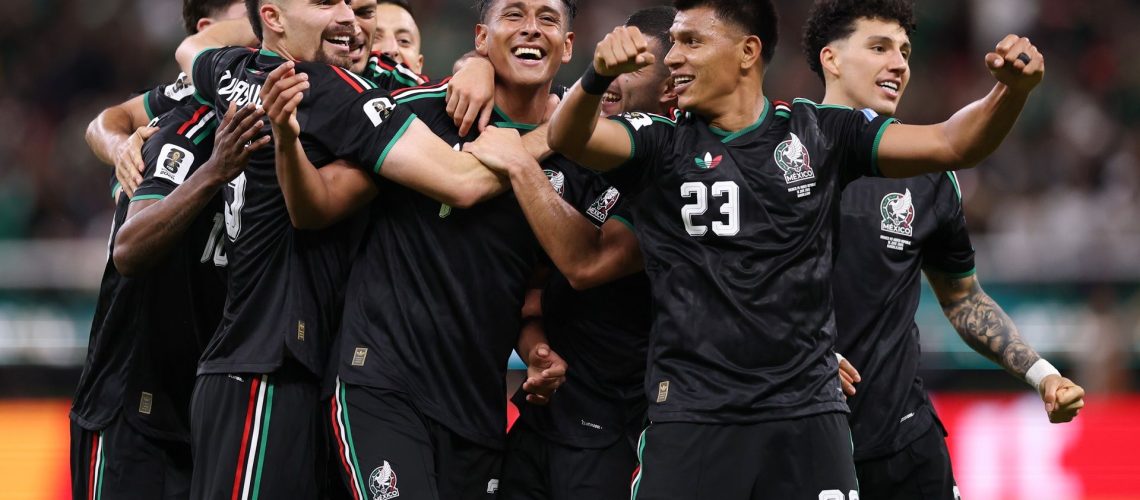 Luis Romo of Mexico celebrates with teammates after scoring his team's first goal during the FIFA World Cup 2026 Group A match between Mexico and Korea Republic