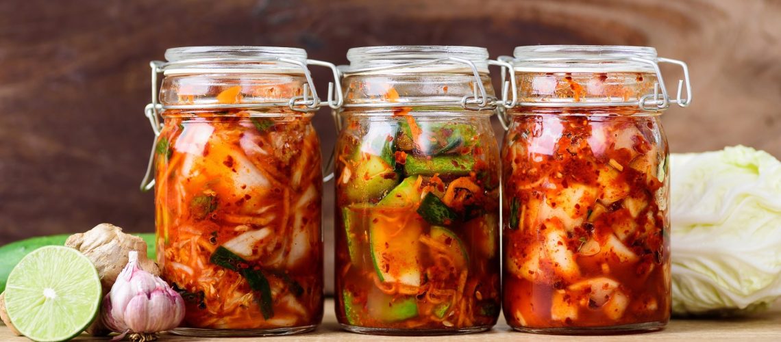 Three jars of homemade kimchi
