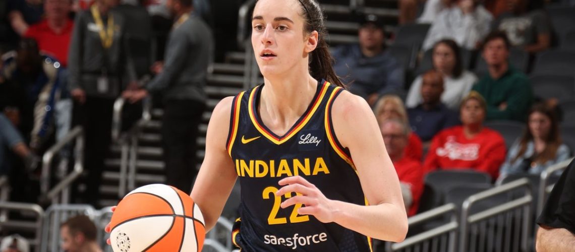Caitlin Clark #22 of the Indiana Fever handles the ball during the WNBA preseason, ahead of the Indiana Fever vs Connecticut Suns