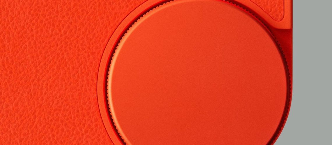 Teaser photo of bright orange dial on the CMF Phone 1