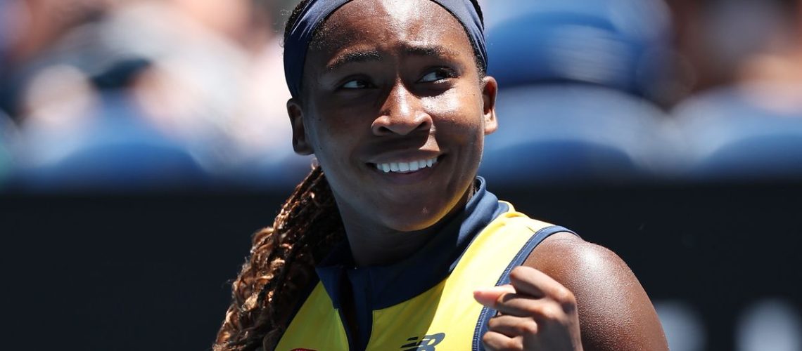 Coco Gauff of the United States, wearing yellow tennis kit, clenches her fist prior to the Dolehide vs Gauff live stream