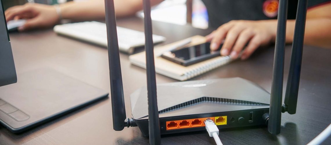 A person trying to set up a new Wi-Fi router