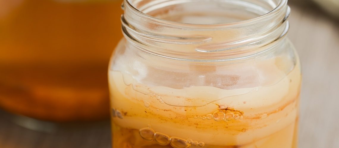 Homemade black tea kombucha. Image Credit: Ildi Papp / Shutterstock. Study: Regular Consumption of Black Tea Kombucha Modulates the Gut Microbiota in Individuals with and without Obesity