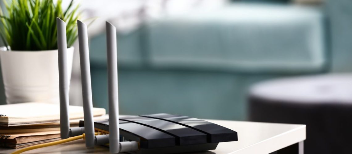 A Wi-Fi router on a table.