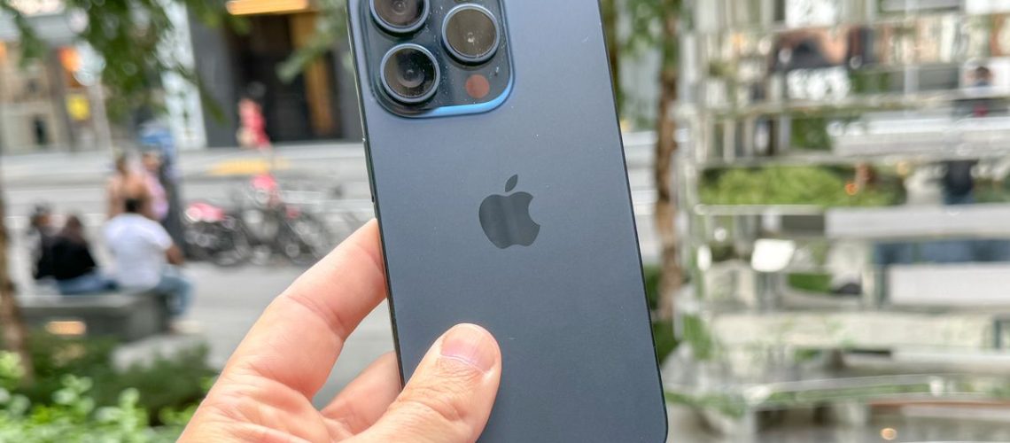 iPhone 15 Pro shown in hand