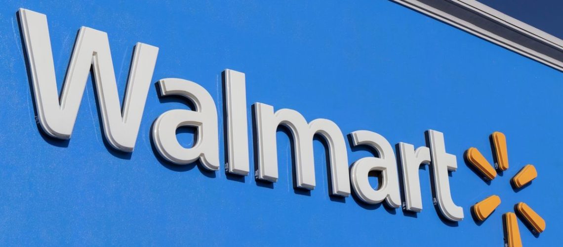 Closeup of the Walmart logo on a store